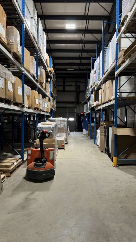 Inside NPP warehouse - aisles of wholesale inventory